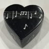 Black heart-shaped soapstone box with white music notes