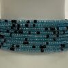 Light blue with black, beaded braceket
