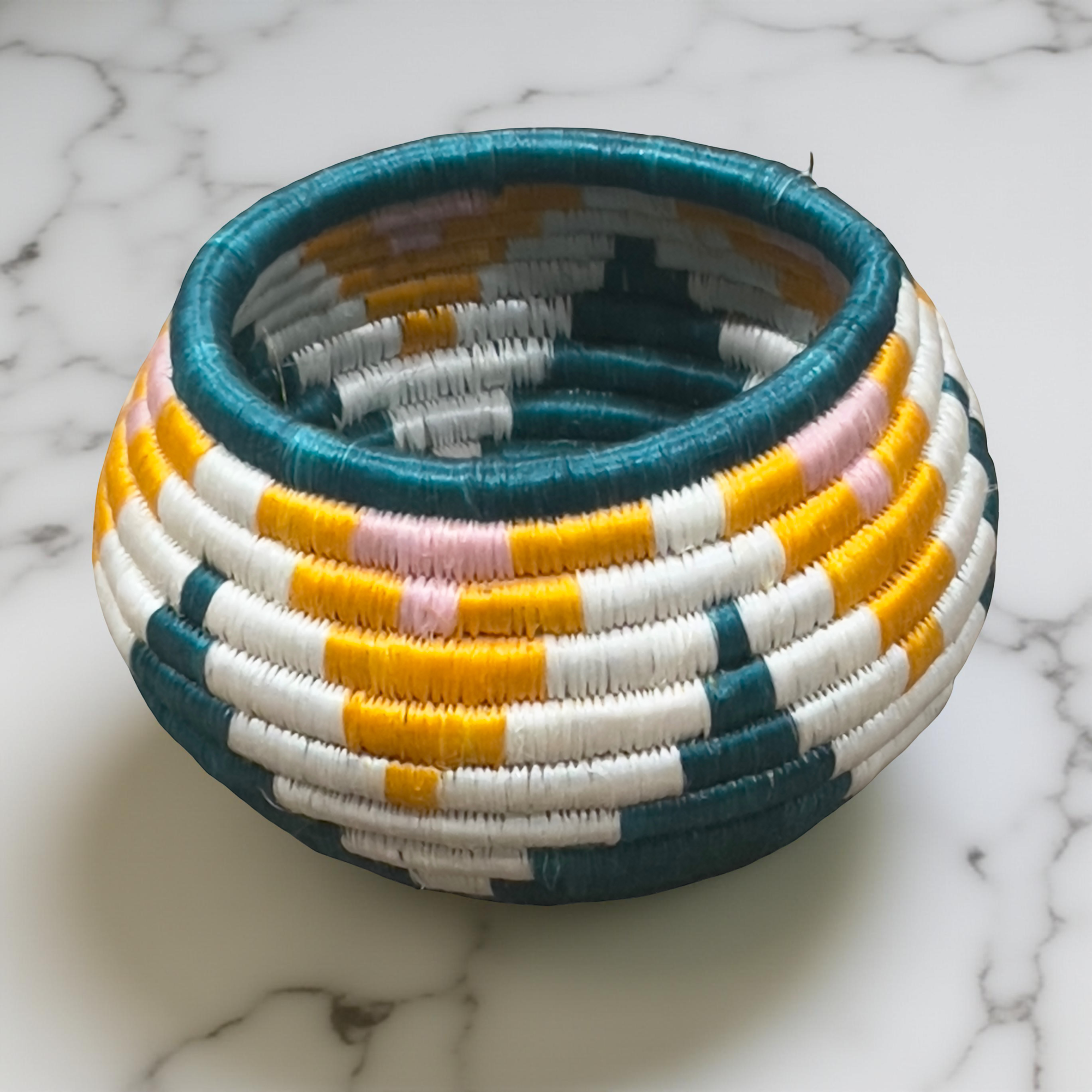 Handwoven African Sisal Trinket Basket approximately 6 Inches base diameter x 3-4 inches Height in Dark Teal, Orange,White